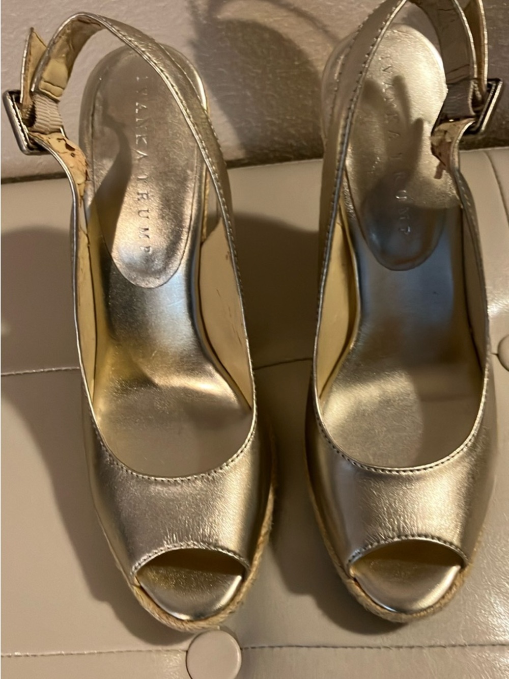 Gold leather and rope espadrille wedge .